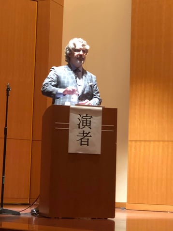 Dr. William Linger, President of the Academy of Microscope Enhanced Dentistry presents a lecture in Tokyo, Japan to the JAMD.